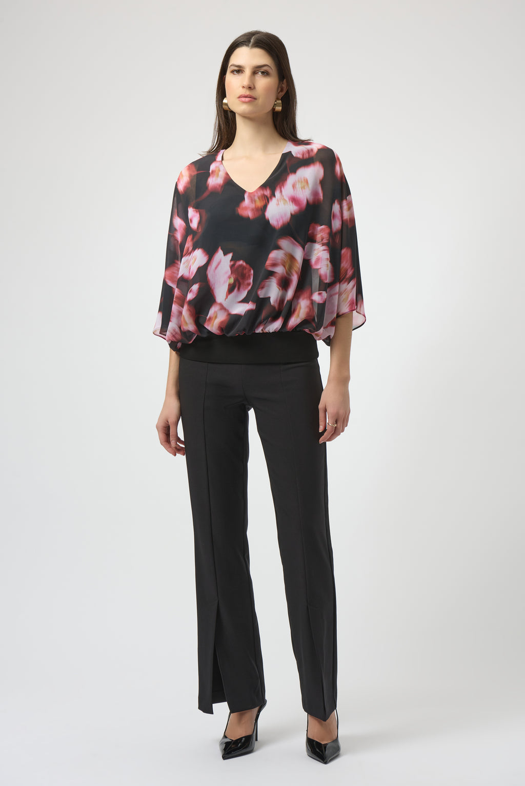 Jaboli Boutique|Fergus Ontario|Joseph Ribkoff | Chiffon Silky Knit Floral Print Cape Top| Joseph Ribkoff black chiffon cape top with pink and rose floral print, featuring V-neckline, dolman sleeves, silky knit waistband, and back bow detail. 100% polyester
