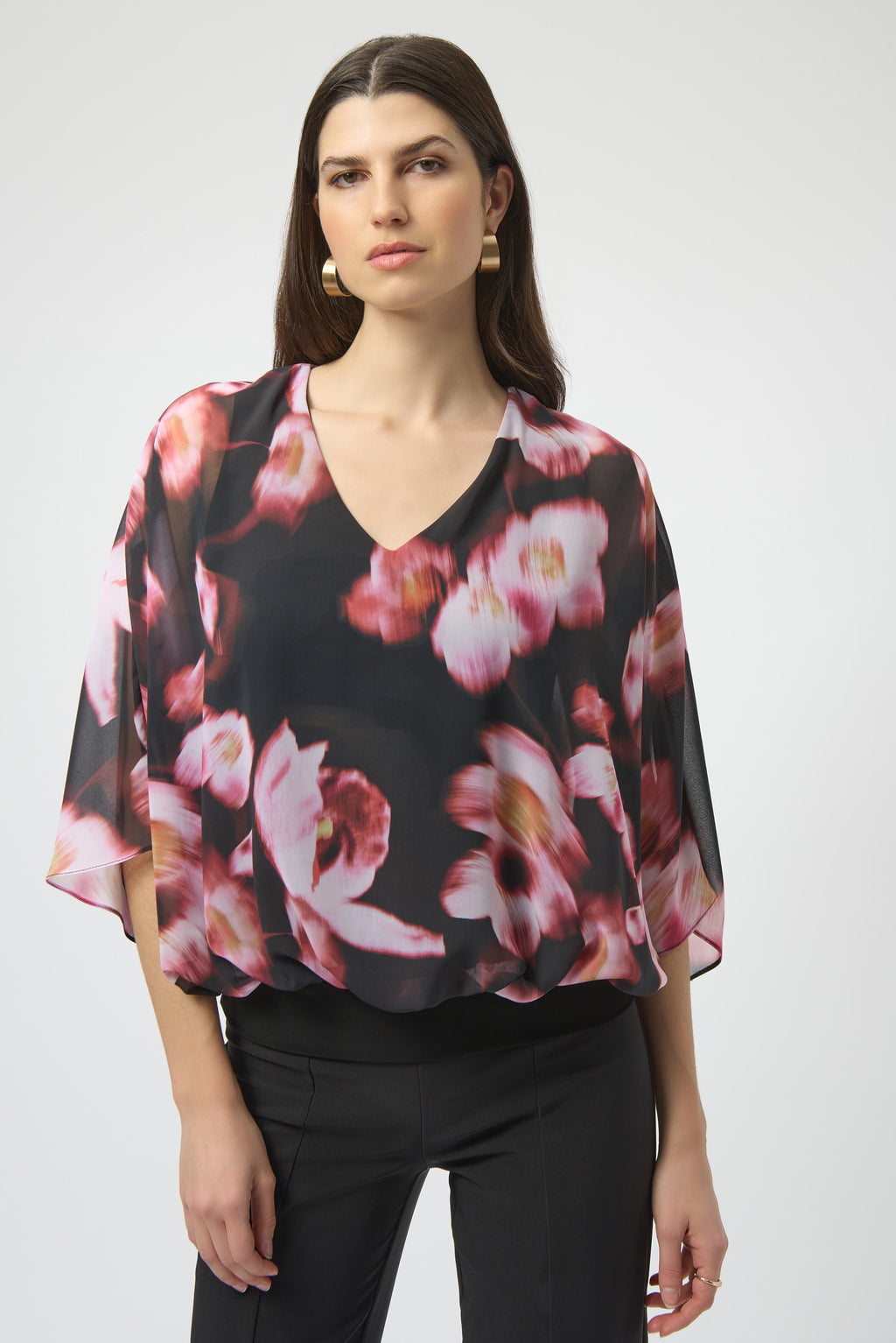 Jaboli Boutique|Fergus Ontario|Joseph Ribkoff | Chiffon Silky Knit Floral Print Cape Top| Joseph Ribkoff black chiffon cape top with pink and rose floral print, featuring V-neckline, dolman sleeves, silky knit waistband, and back bow detail. 100% polyester