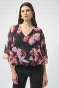 Jaboli Boutique|Fergus Ontario|Joseph Ribkoff | Chiffon Silky Knit Floral Print Cape Top| Joseph Ribkoff black chiffon cape top with pink and rose floral print, featuring V-neckline, dolman sleeves, silky knit waistband, and back bow detail. 100% polyester