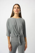 Jaboli Boutique|Fergus Ontario|Joseph Ribkoff | Melange Silky Knit Boxy Top with Knot Detail|253304-2988-3
Grey melange silky knit top with a soft silver shimmer, featuring a scoop neckline, relaxed three-quarter dolman sleeves, a side knot detail at the waist, and a wide waistband for a flattering, sculpted silhouette.

