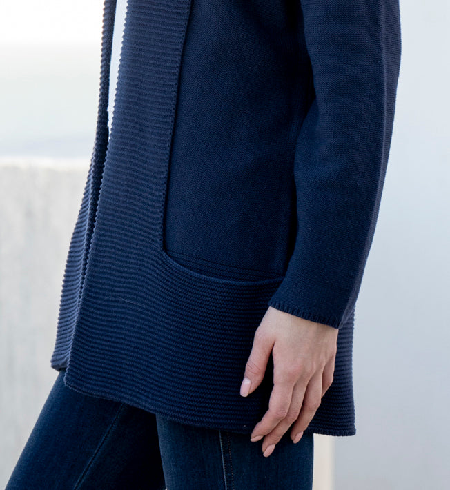Jaboli Boutique | Fergus Ontario| Marble | Classic Cardigan. Colour Navy.
Marble Classic Cardigan with shawl collar, long sleeves, thigh-length relaxed fit, and pockets, in navy and cognac, perfect for layering over office or casual outfits.
