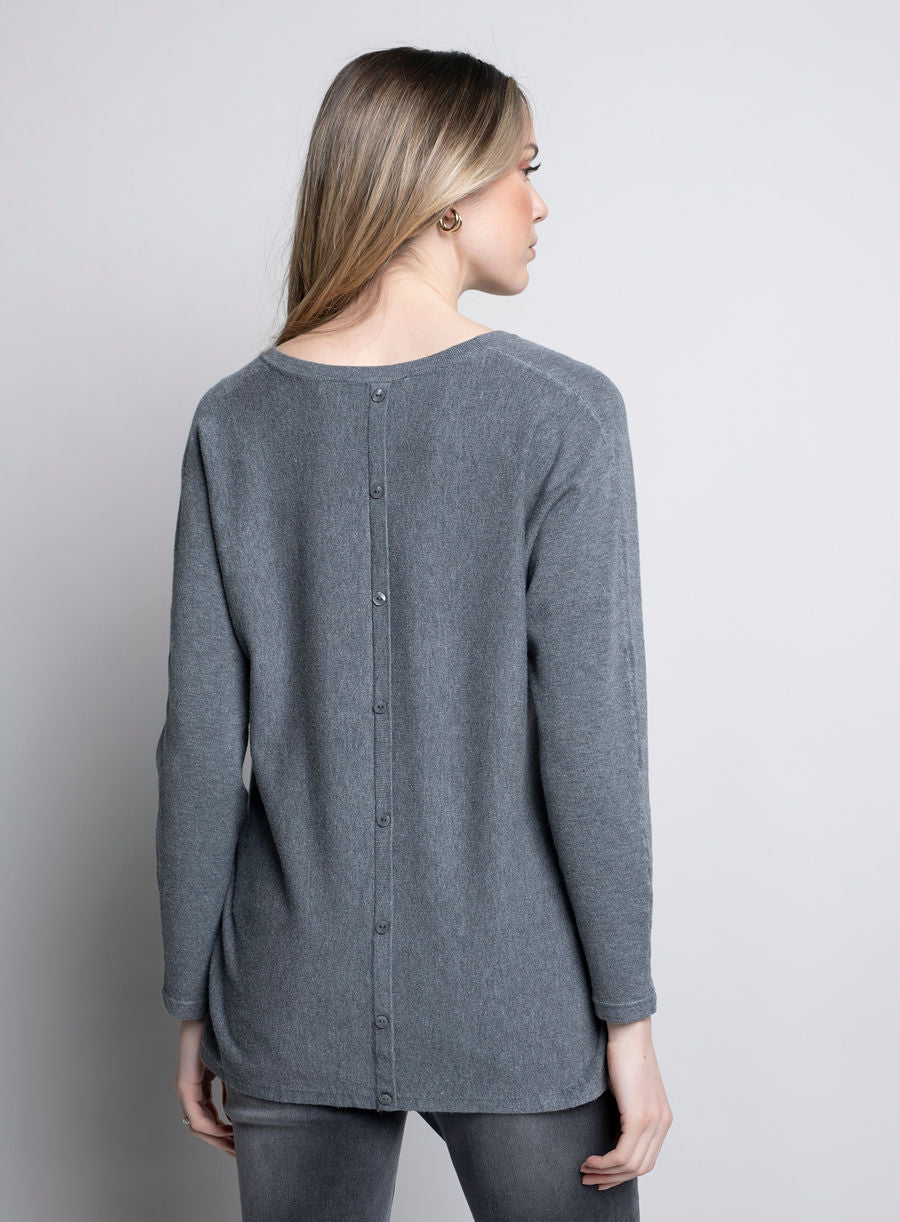 Jaboli_boutique-Fergus_Ontario-Picadilly_Charcoal_V-Neck_Sweater-BK750
Vee Neck Super Soft Knit Pullover Sweater
Colour: Charcoal Grey
Relaxed fit with long sleeves for a cozy, effortless look
Button-back detail adds a subtle touch of charm
Made from a soft blend of 50% viscose, 28% nylon, and 22% polyester
Longer length, perfect for layering
Ideal for pairing with a Turtle Neck Tank for extra warmth
Great for chilly days, errands, or weekend outings