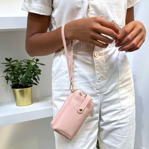 Jaboli Boutique - Fergus Ontario - Espe -Smartphone Pouch    Measuring 4"x6.5", the Espe Smartphone Pouch comes with a cross-body and wristlet attachment and is offered in four stylish colours.  Black, Beige,  Pastel Yellow, Blush Pink