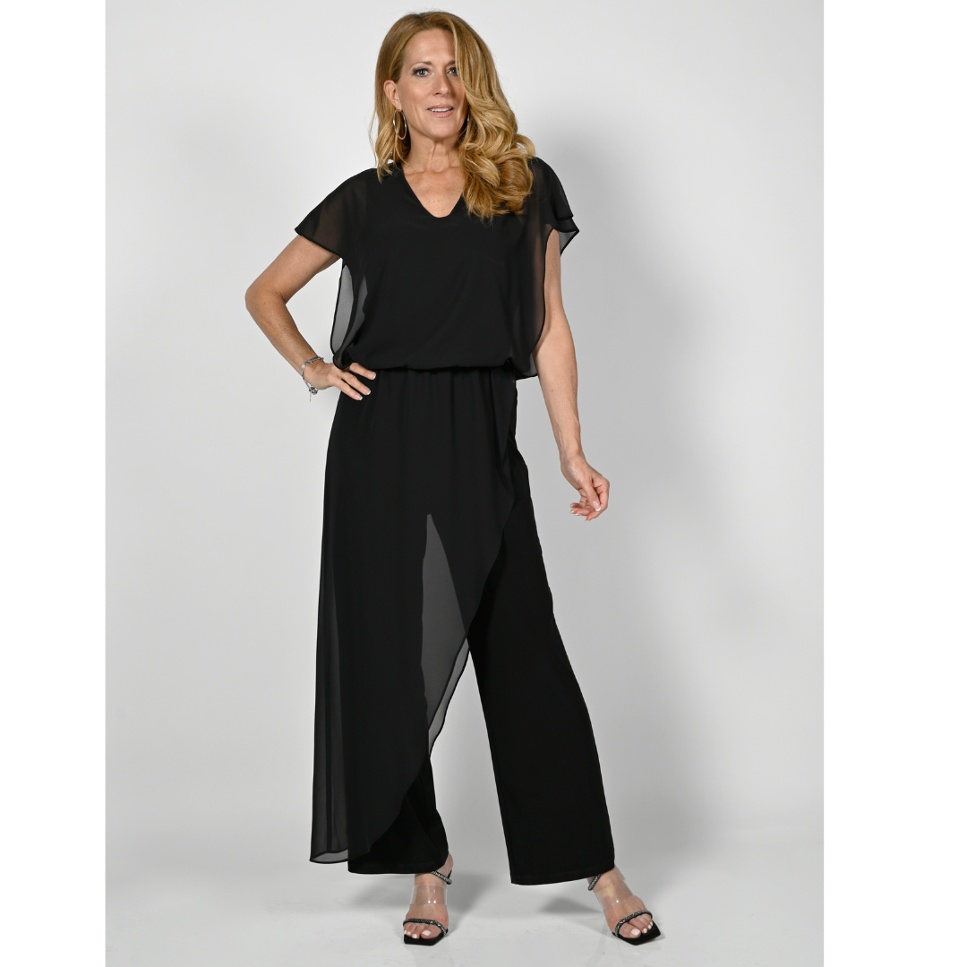 Jaboli Boutique - Fergus Ontario - Frank Lyman - Jumpsuit With Chiffon Overlay. Vee Neck Cap Sleeve Jumpsuit with Blouson Top  Chiffon floating over Jersey  Special Event Dressy  Pair with your Favourite Sparkly Necklace  Pictured Is The Jumpsuit In Black. Jumpsuit Is Stocked In Dark Navy Blue.
