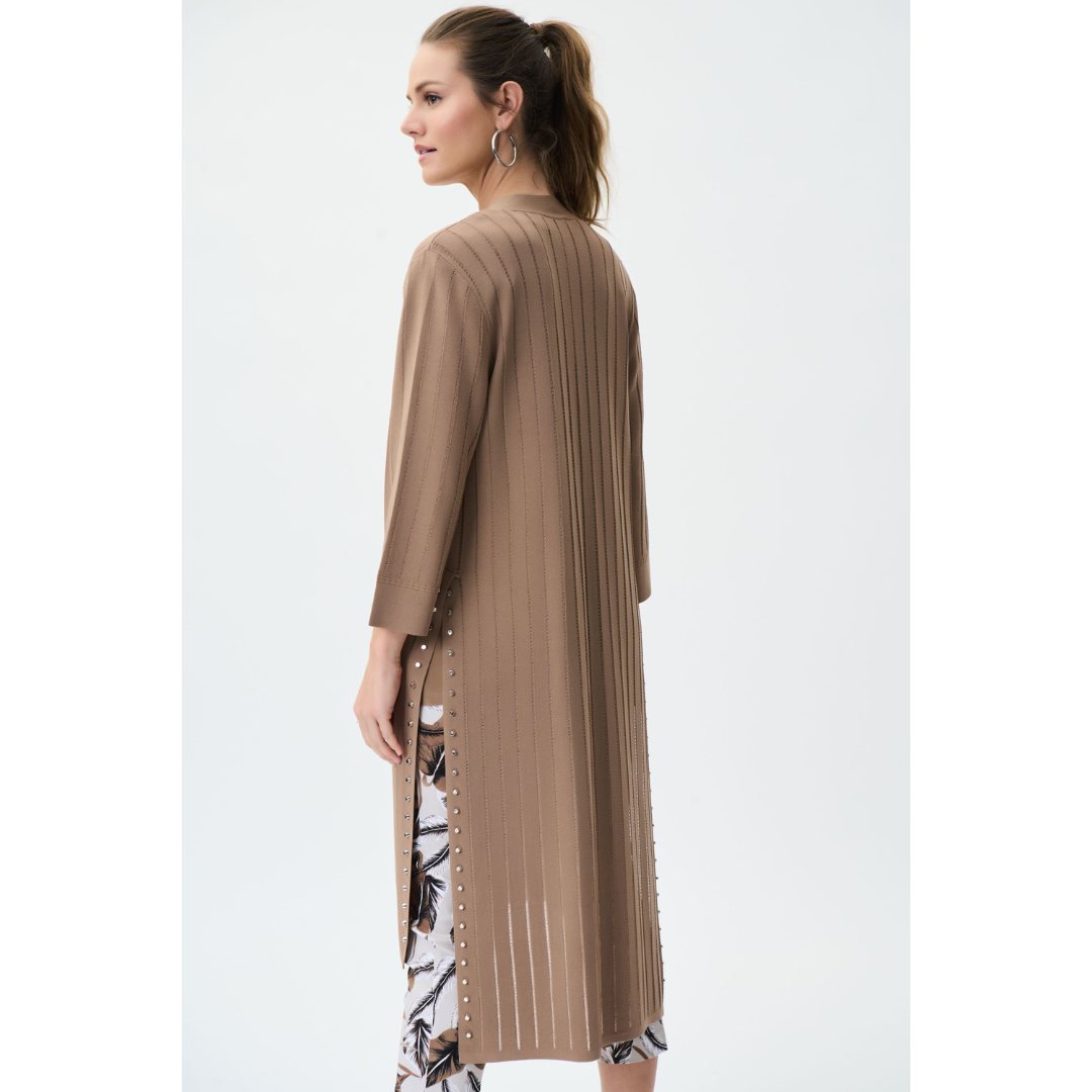 Jaboli Boutique - Fergus Ontario  Joseph Ribkoff - Long Ribbed Studded Cardigan. A Must Have For everyone This Summer. This Classic Joseph Ribkoff Garment Is Already Becoming A Fav At Jaboli. Dress It Or Down This Cardigan Knows No Bounds! Perfect For Travelling. Open Front. Long Sleeve Cardigan/Coverup. High Low Hemline. Studded Side Slits. Comes in Two Colour Ways Vanilla & Nutmeg