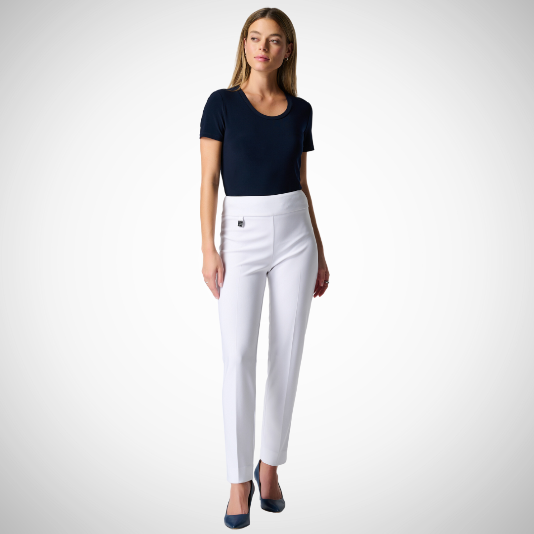 Jaboli boutique - Fergus Ontario - Joseph Ribkoff - White Pull on Pant. If you're looking for a chic and sophisticated option, the Joseph Ribkoff Slim Fit White Pant is a great choice. These pants boast a timeless and refined appearance, featuring a slim-fit, high-rise waist, and full-length cut that can be conveniently pulled on.