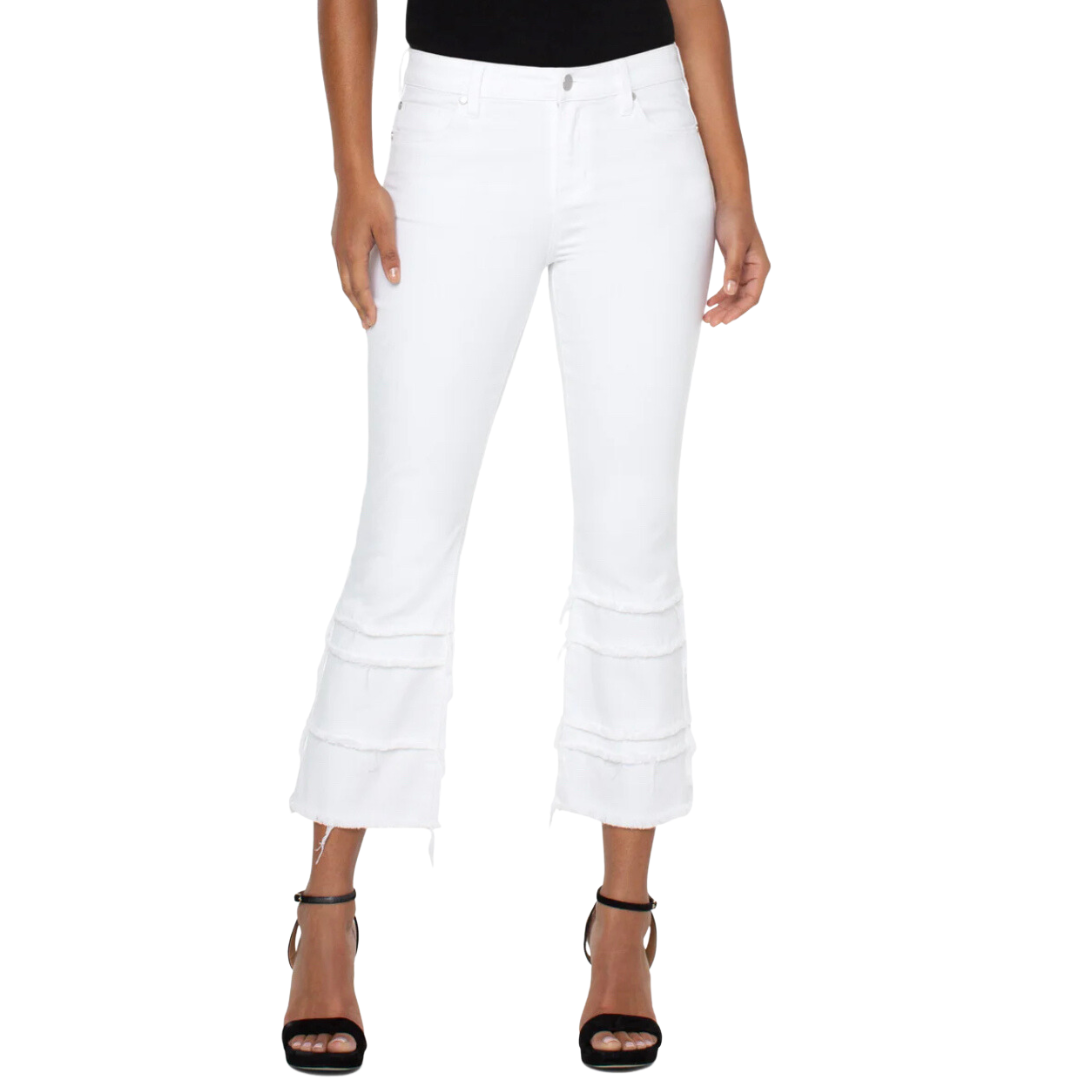 Jaboli Boutique - Fergus Ontario - Liverpool - Hannah - Cropped, Flare, White Denim. Enjoy the comfort and confidence you'll feel while wearing this jean. With its mid-rise design and 5-pocket styling details, you can easily dress it up or down to match any occasion. It features a 25-1/2'' inseam, 9-3/4" front rise, 17-1/2" leg opening, single logo button closure, and belt loops, ensuring a perfect fit that flatters your figure.