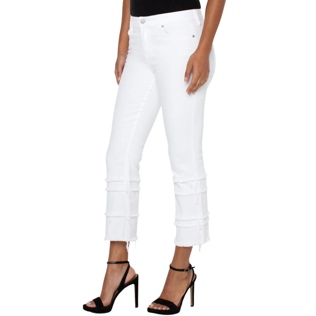 Jaboli Boutique - Fergus Ontario - Liverpool - Hannah - Cropped, Flare, White Denim. Enjoy the comfort and confidence you'll feel while wearing this jean. With its mid-rise design and 5-pocket styling details, you can easily dress it up or down to match any occasion. It features a 25-1/2'' inseam, 9-3/4" front rise, 17-1/2" leg opening, single logo button closure, and belt loops, ensuring a perfect fit that flatters your figure.