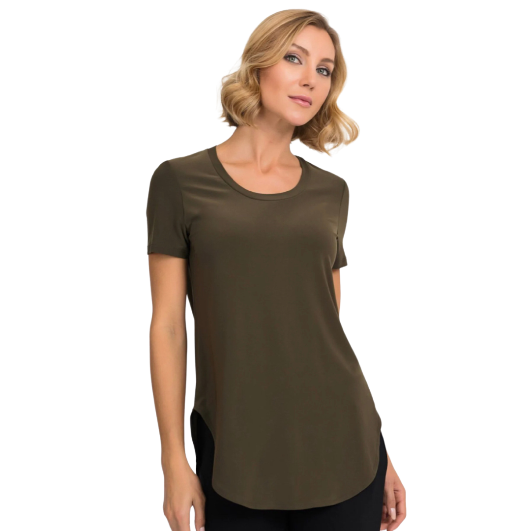 Gorgeous Essential T-Shirt Made Up Of Joseph Ribkoff Classic Jersey Material.  Perfect As A Layering Piece Or Stand Alone Top  Crew Neck,  Short Sleeves,  Sculpted Hemline Helps To Allow Movement Through The Torso.  Proudly Made In Canada.. Comes In 4 Colours Avocado, Nutmeg, Palm Springs (turquoise blue) , Dazzle Pink (neutral saturated pink)